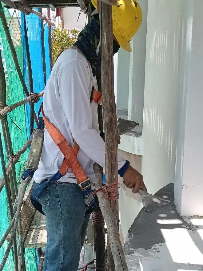 Surface preparation before external wall repainting